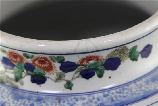 A massive Chinese wucai baluster jar and cover, early Kangxi period, c.1670, approx. height 50cm width 37cm, slight faults
